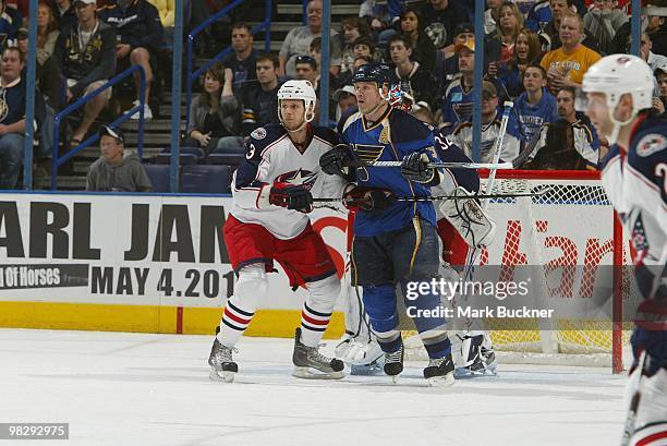 Keith Tkachuk of the St. Louis Blues battles Marc Methot of the Columbus Blue Jackets in front of the net on April 5, 2010 at Scottrade Center in St....