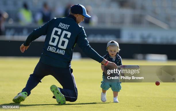 Joe Root and his 17 month old son Alfred play on the field after the fifth Royal London One-Day International match between England and Australia at...