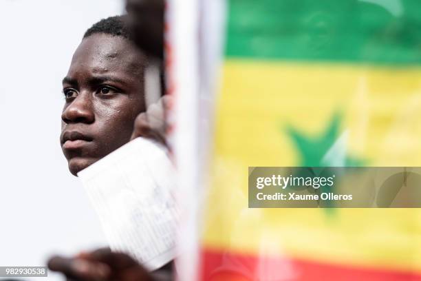 Senegal fans watch game two of group H between Japan and Senegal at Obelisque square on June 24, 2018 in Dakar, Senegal. . The game finished 2-2...