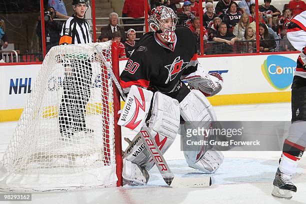 Cam Ward of the Carolina Hurricanes stands tall in the crease to protect the goal during a NHL game against the New Jersey Devils on April 3, 2010 at...