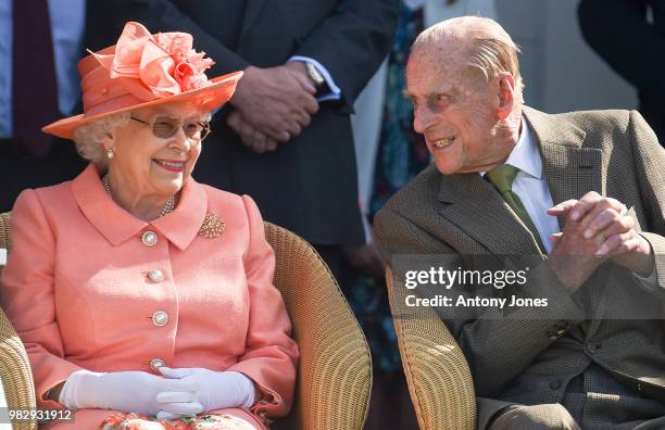 Queen Elizabeth II and Prince Philip, Duke of Edinburgh attend The OUT-SOURCING Inc Royal Windsor Cup 2018 polo match at Guards Polo Club on June 24,...