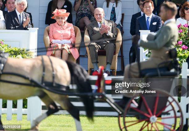 Queen Elizabeth II and Prince Philip, Duke of Edinburgh attend The OUT-SOURCING Inc Royal Windsor Cup 2018 polo match at Guards Polo Club on June 24,...