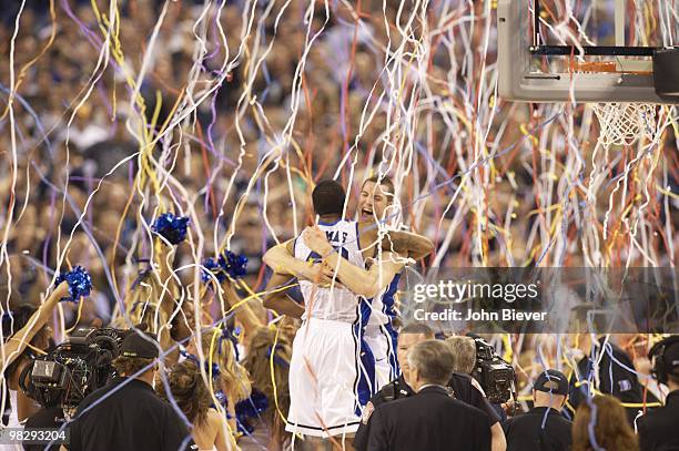 Final Four: Duke Lance Thomas and Miles Plumlee victorious, hugging during celebration after winning National Championship game vs Butler....