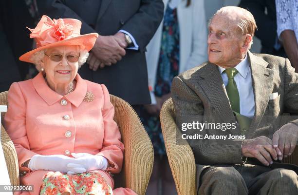 Queen Elizabeth II and Prince Philip, Duke of Edinburgh attend The OUT-SOURCING Inc Royal Windsor Cup 2018 polo match at Guards Polo Club on June 24,...