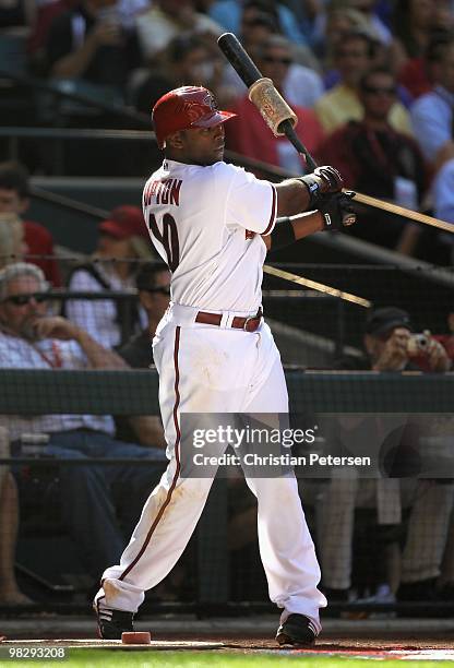 Justin Upton of the Arizona Diamondbacks warms up on deck during the Opening Day major league baseball game against the San Diego Padres at Chase...