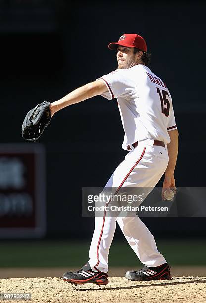 Starting pitcher Dan Haren of the Arizona Diamondbacks pitches against the San Diego Padres during the Opening Day major league baseball game at...