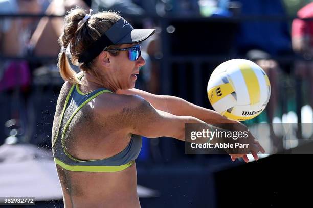 April Ross pumps the ball against Kelly Claes and Brittany Hichevar during the final rounds of the AVP Seattle Open at Lake Sammamish State Park on...