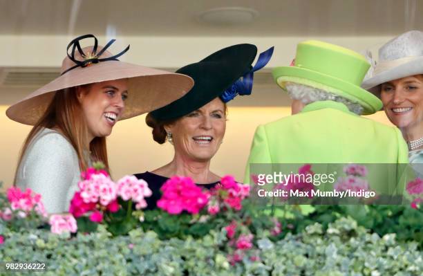 Princess Beatrice and Sarah, Duchess of York seen talking with Queen Elizabeth II in the Royal Box before watching The Queen's horse 'Elector' run in...