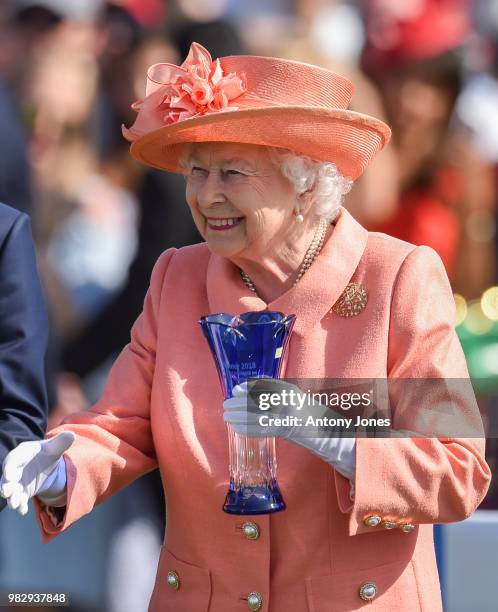 Queen Elizabeth II attends The OUT-SOURCING Inc Royal Windsor Cup 2018 polo match at Guards Polo Club on June 24, 2018 in Egham, England.