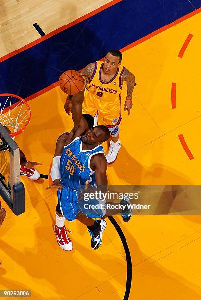 Emeka Okafor of the New Orleans Hornets goes to the basket during the game against the Golden State Warriors on March 17, 2009 at Oracle Arena in...