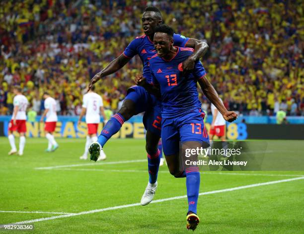 Yerry Mina of Colombia celebrates after scoring his team's first goal with Davinson Sanchez of Colombia during the 2018 FIFA World Cup Russia group H...