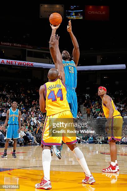 Emeka Okafor of the New Orleans Hornets goes up for a shot over Anthony Tolliver of the Golden State Warriors during the game on March 17, 2009 at...