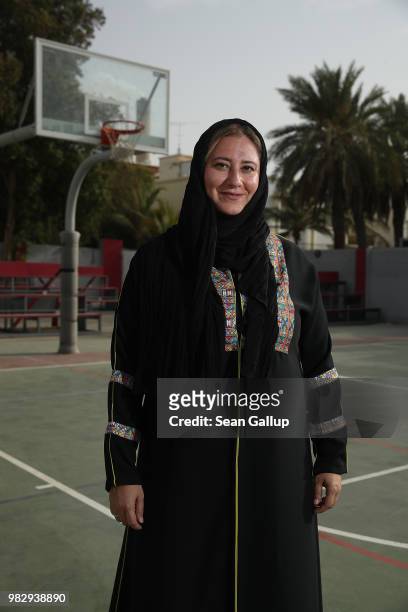 Lina Khaled Al-Maeena, a member of the 180-member Shura Council that advises Saudi King Salman bin Abdulaziz, poses for a photo as she stands on the...