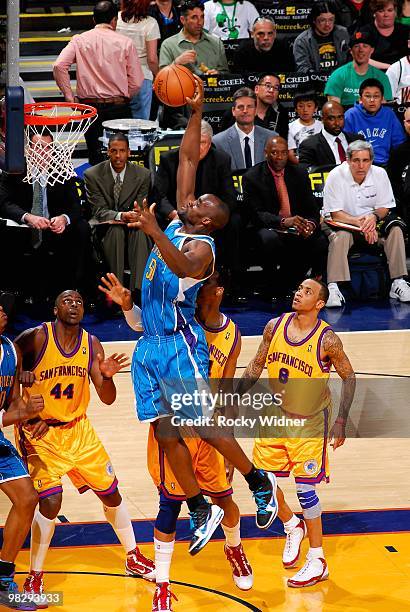 Emeka Okafor of the New Orleans Hornets goes to the basket during the game against the Golden State Warriors on March 17, 2009 at Oracle Arena in...