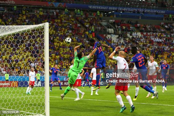 Yerry Mina of Colombia scores a goal to make it 0-1 during the 2018 FIFA World Cup Russia group H match between Poland and Colombia at Kazan Arena on...