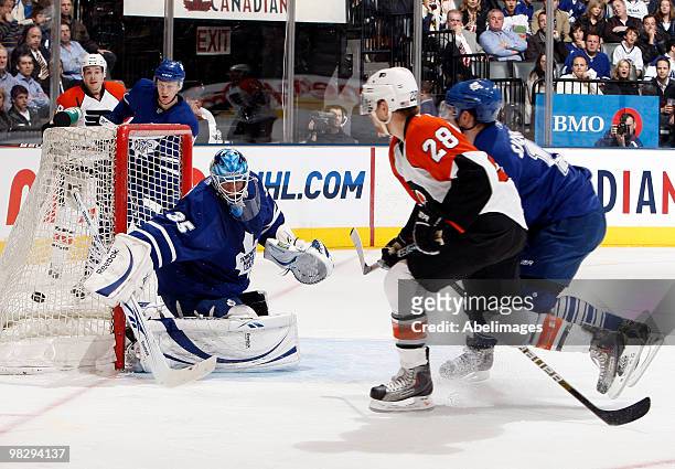 Claude Giroux of the Philadelphia Flyers scores on Jean-Sebastien Giguere of the Toronto Maple Leafs during an NHL game at the Air Canada Centre...