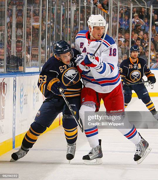 Tyler Ennis of the Buffalo Sabres tries to skate past Marc Staal of the New York Rangers on April 6, 2010 at HSBC Arena in Buffalo, New York.