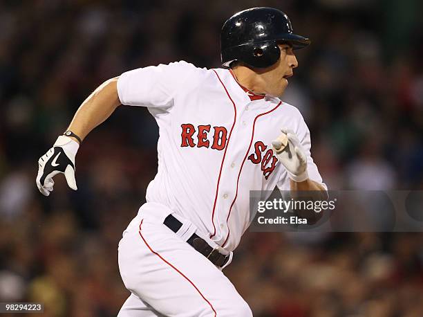 Jacoby Ellsbury of the Boston Red Sox heads to first base in the first inning against the New York Yankees on April 6, 2010 at Fenway Park in Boston,...