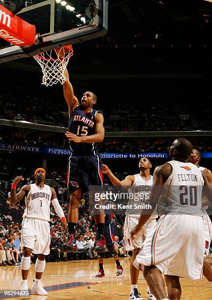 Al Horford of the Atlanta Hawks goes for the layup against Boris Diaw of the Charlotte Bobcats on April 6, 2010 at the Time Warner Cable Arena in...
