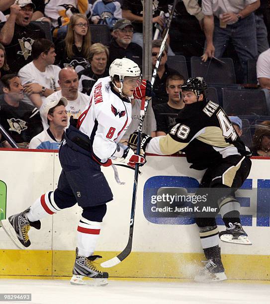 Alex Ovechkin of the Washington Capitals collides with Tyler Kennedy of the Pittsburgh Penguins in the first period at Mellon Arena on April 6, 2009...