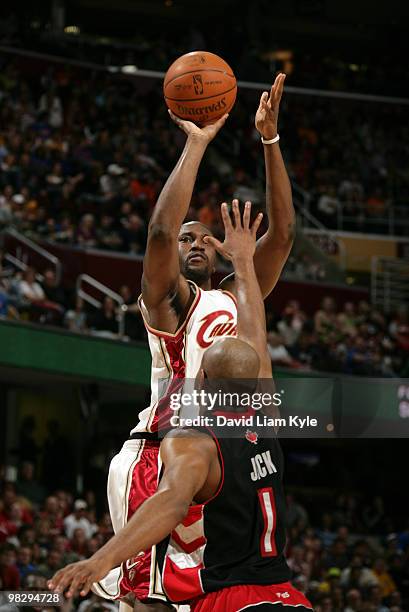 Jawad Williams of the Cleveland Cavaliers shoots over Jarrett Jack of the Toronto Raptors on April 6, 2010 at The Quicken Loans Arena in Cleveland,...