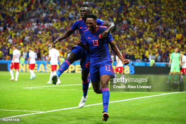 Yerry Mina of Colombia celebrates after scoring his team's first goal with Davinson Sanchez of Colombia during the 2018 FIFA World Cup Russia group H...