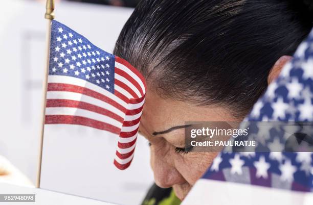 Suki Castillo Ramos, from Socorro, Texas is pictured during a prayer at the "End Family Detention," event held at the Tornillo Port of Entry in...