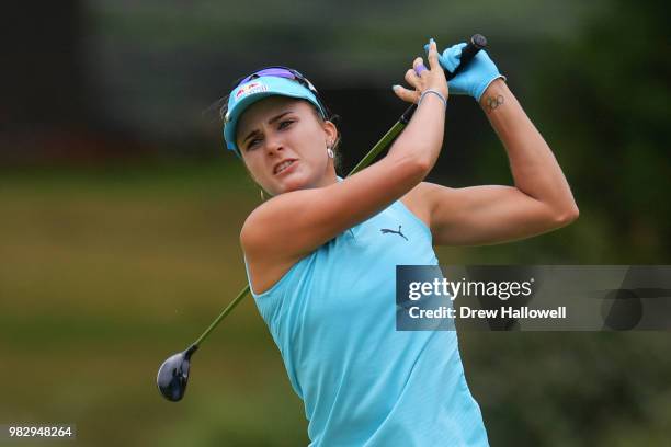 Lexi Thompson plays her tee shot on the fifth hole during the final round of the Walmart NW Arkansas Championship Presented by P&G at Pinnacle...