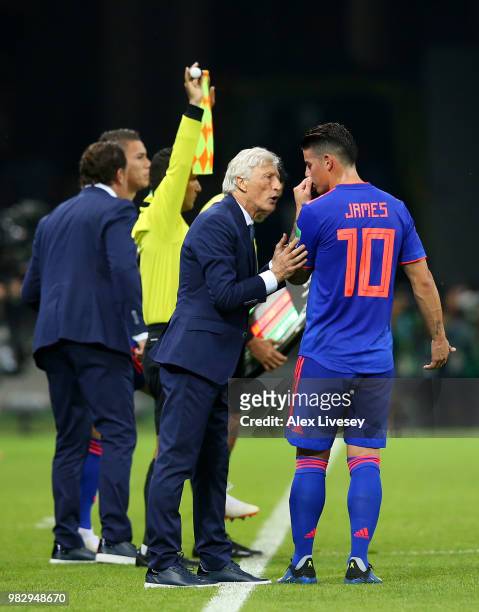 Jose Pekerman, Head coach of Colombia speaks to James Rodriguez of Colombia during the 2018 FIFA World Cup Russia group H match between Poland and...