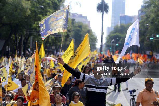 Supporters of Mexico's presidential candidate Ricardo Anaya, standing for the "Mexico al Frente" coalition of the PAN-PRD-Movimiento Ciudadano...