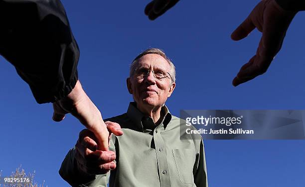 Senate Majority Leader Harry Reid greets supporters during a rally at University of Nevada-Reno April 6, 2010 in Reno, Nevada. Sen. Reid continues...
