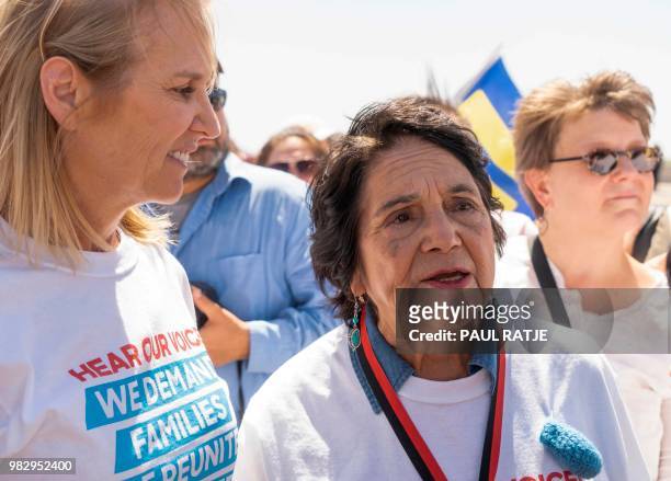 Human Rights Activist Dolores Huerta speaks to the media as Kerry Kennedy looks on during the "End Family Detention," event held at the Tornillo Port...