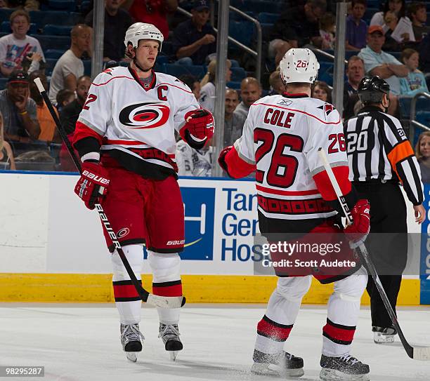 Eric Staal of the Carolina Hurricanes celebrates a second-period goal with teammate Erik Cole against the Tampa Bay Lightning at the St. Pete Times...