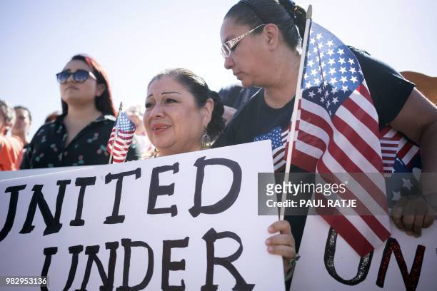 Activists shout chants during the "End Family Detention," event held at the Tornillo Port of Entry in Tornillo, Texas on June 24, 2018. - Texas is at...