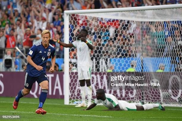 Keisuke Honda of Japan celebrates after equalising during the 2018 FIFA World Cup Russia group H match between Japan and Senegal at Ekaterinburg...