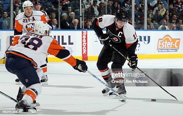 Mike Richards of the Philadelphia Flyers skates against the New York Islanders on April 1, 2010 at Nassau Coliseum in Uniondale, New York. The Isles...