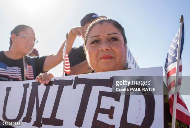 Suki Castillo Ramos, from Socorro, Texas looks on during the "End Family Detention," event held at the Tornillo Port of Entry in Tornillo, Texas on...