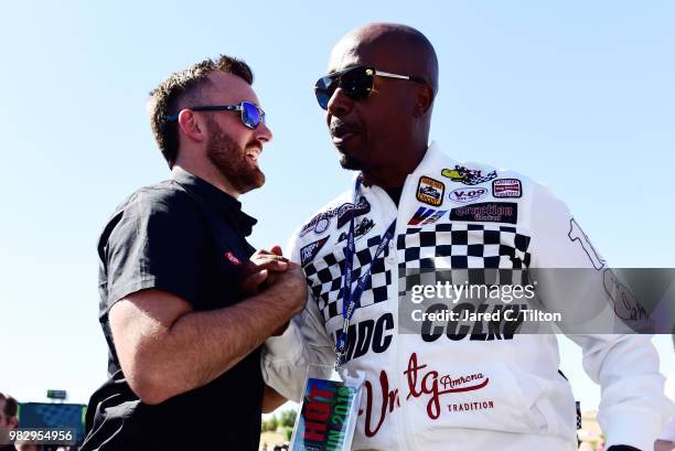 Austin Dillon, driver of the Dow Chevrolet, and MC Hammer attend the driver's meeting prior to the Monster Energy NASCAR Cup Series Toyota/Save Mart...