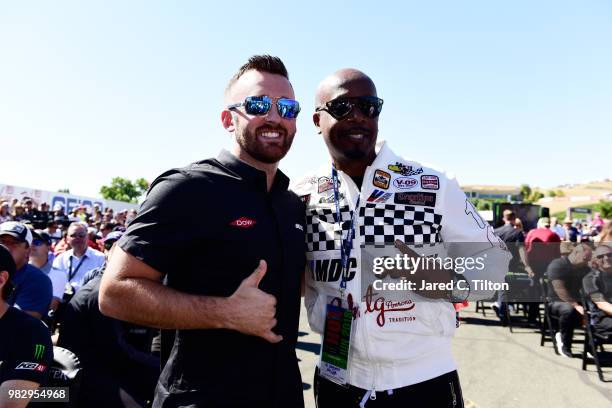 Austin Dillon, driver of the Dow Chevrolet, and MC Hammer attend the driver's meeting prior to the Monster Energy NASCAR Cup Series Toyota/Save Mart...