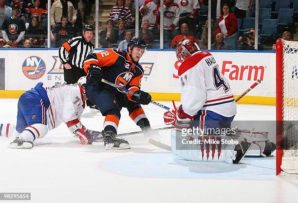 Josh Bailey of the New York Islanders is denied by goaltender Jaroslav Halak of the Montreal Canadiens on April 6, 2010 at Nassau Coliseum in...