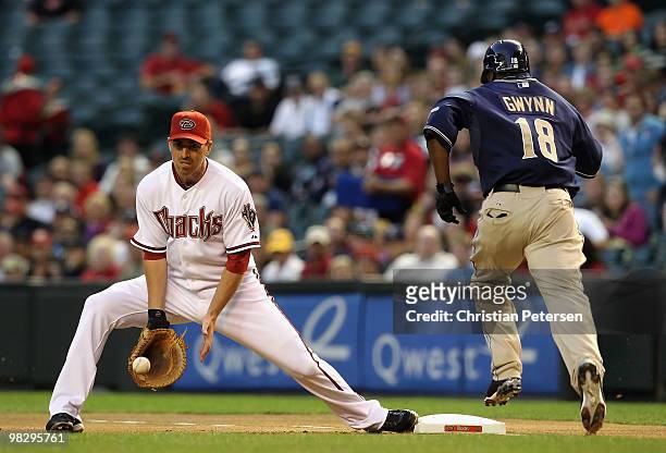 Infiedler Adam LaRoche of the Arizona Diamondbacks catches the ball for an out on Tony Gwynn of the San Diego Padres during the major league baseball...
