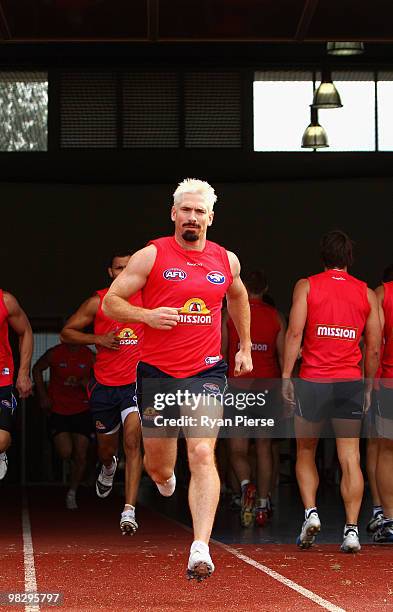 Jason Akermanis of the Bulldogs runs onto the ground during a Western Bulldogs AFL training session at the Whitten Oval on April 7, 2010 in...