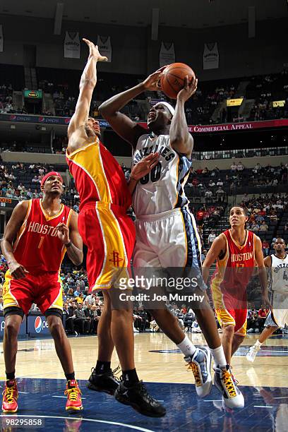 Zach Randolph of the Memphis Grizzlies shoots over Jordan Jeffries of the Houston Rockets on April 06, 2010 at FedExForum in Memphis, Tennessee. NOTE...