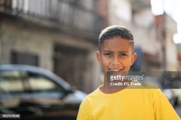 brazilian kid portrait at favela - boys stock pictures, royalty-free photos & images