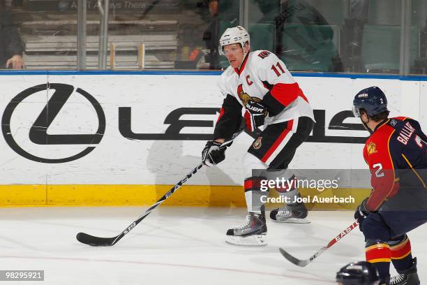 Daniel Alfredsson of the Ottawa Senators skates with the puck against the Florida Panthers on April 6, 2010 at the BankAtlantic Center in Sunrise,...