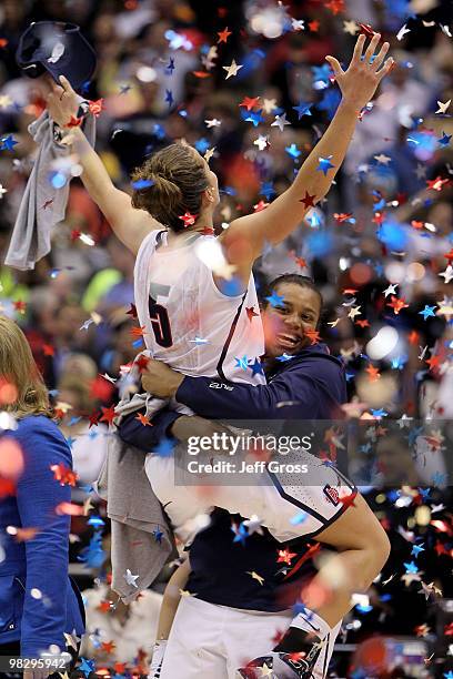 Kaili McLaren hugs Caroline Doty of the Connecticut Huskies after a 57-43 win against the Stanford Cardinal during the NCAA Women's Final Four...