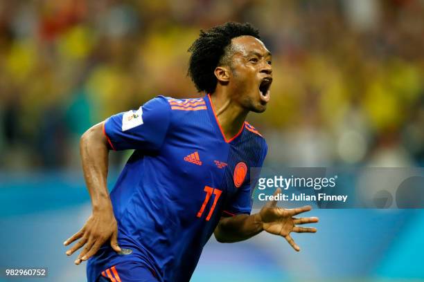 Juan Cuadrado of Colombia celebrates after scoring his team's third goal during the 2018 FIFA World Cup Russia group H match between Poland and...