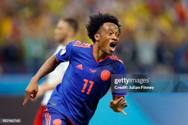 Juan Cuadrado of Colombia celebrates after scoring his team's third goal during the 2018 FIFA World Cup Russia group H match between Poland and...