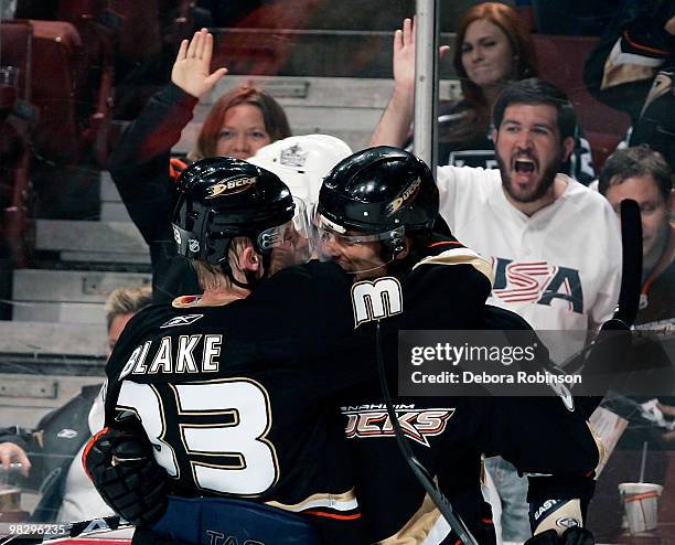 Teemu Selanne and Jason Blake of the Anaheim Ducks celebrate a first period goal from Teemu Selanne against the Los Angeles Kings during the game on...