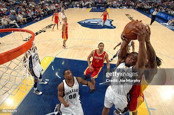 Sam Young of the Memphis Grizzlies and Jordan Hill of the Houston Rockets on April 06, 2010 at FedExForum in Memphis, Tennessee. NOTE TO USER: User...